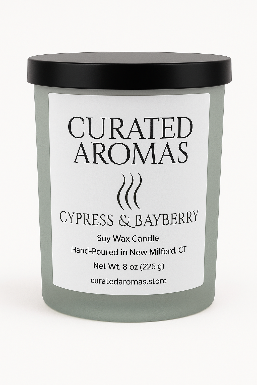 Green Candle with 'Curated Aromas'  Cypress & Bayberry label on a white background